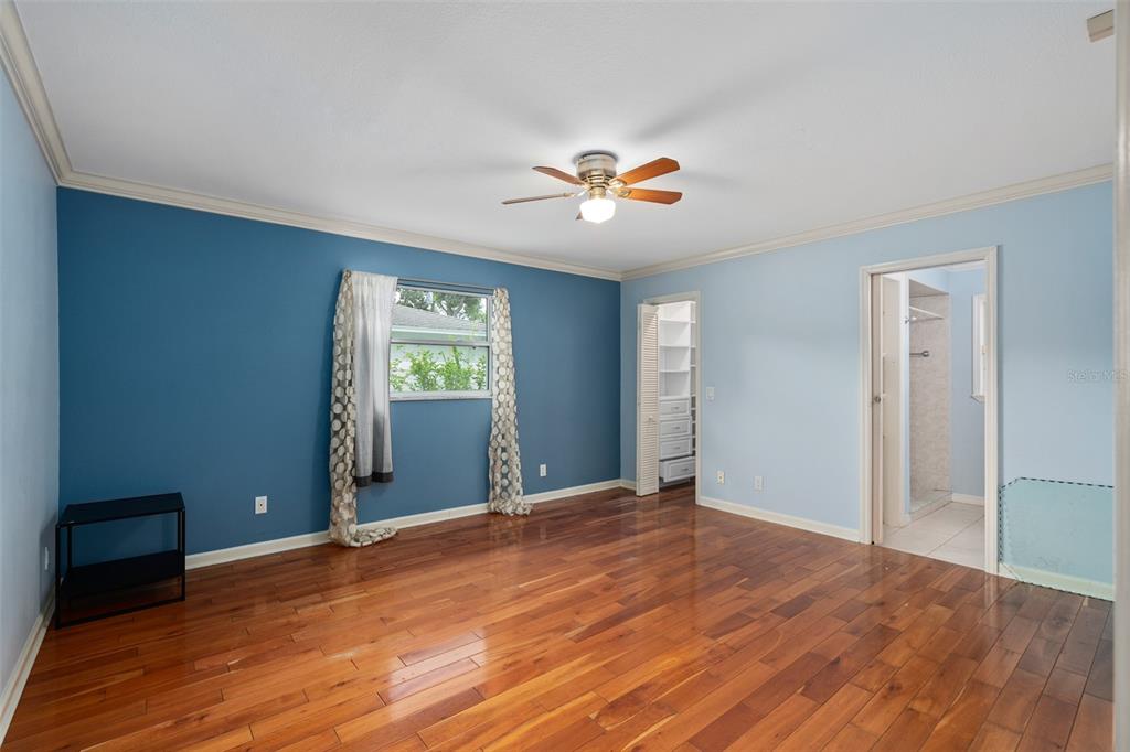 744 Cornwall Road Winter Park, FL 32792 - Photo 16 of 57 wooden floor in an empty room with a window
