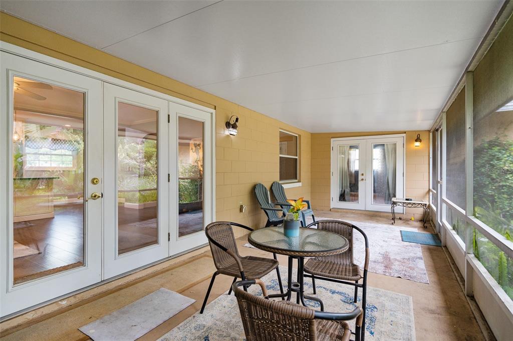 744 Cornwall Road Winter Park, FL 32792 - Photo 20 of 33 a dining room with furniture and large windows
