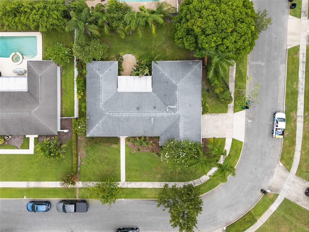 744 Cornwall Road Winter Park, FL 32792 - Photo 23 of 57 an aerial view of a house with a yard and pool