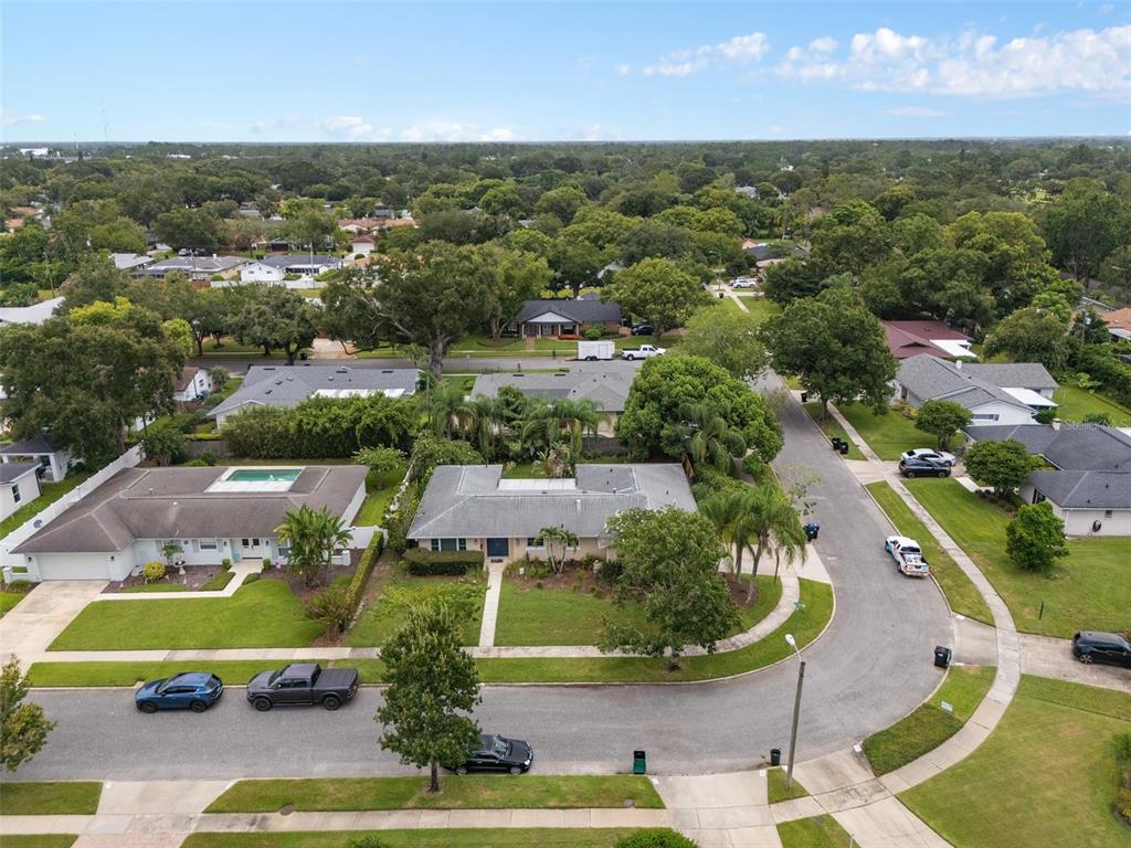 744 Cornwall Road Winter Park, FL 32792 - Photo 24 of 57 an aerial view of residential houses with outdoor space and trees