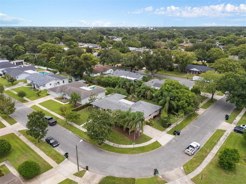 744 Cornwall Road Winter Park, FL 32792 - Photo 25 of 57 an aerial view of residential houses with outdoor space and trees