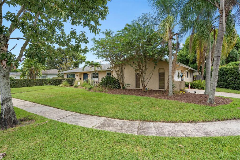 744 Cornwall Road Winter Park, FL 32792 - Photo 28 of 57 a view of a house with a backyard