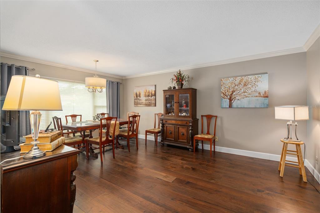 744 Cornwall Road Winter Park, FL 32792 - Photo 7 of 33 a living room with furniture and wooden floor