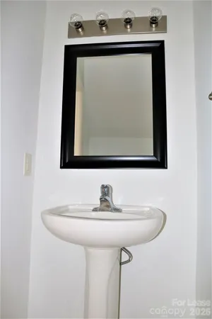 a sink with a mirror