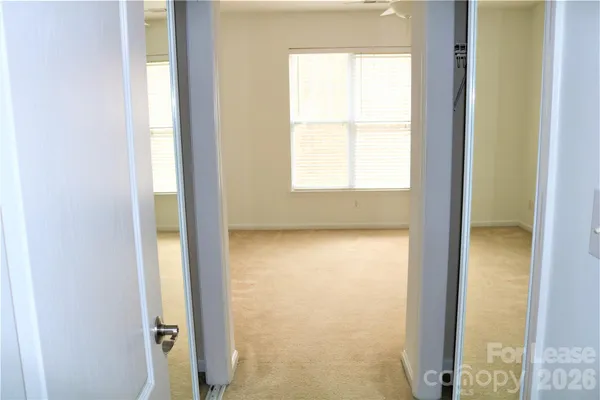 a view of a room with a window