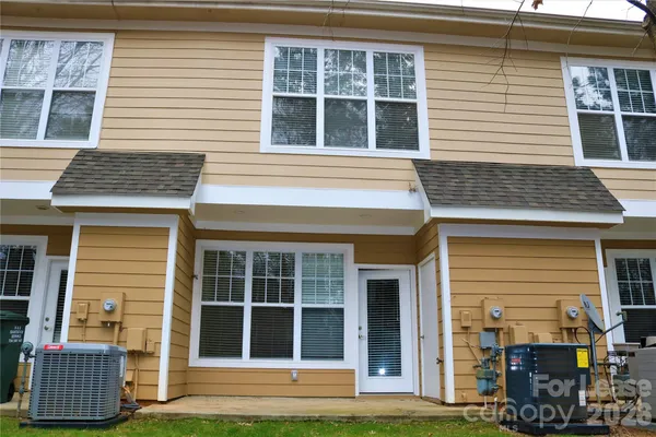 a view of a backyard with a trees