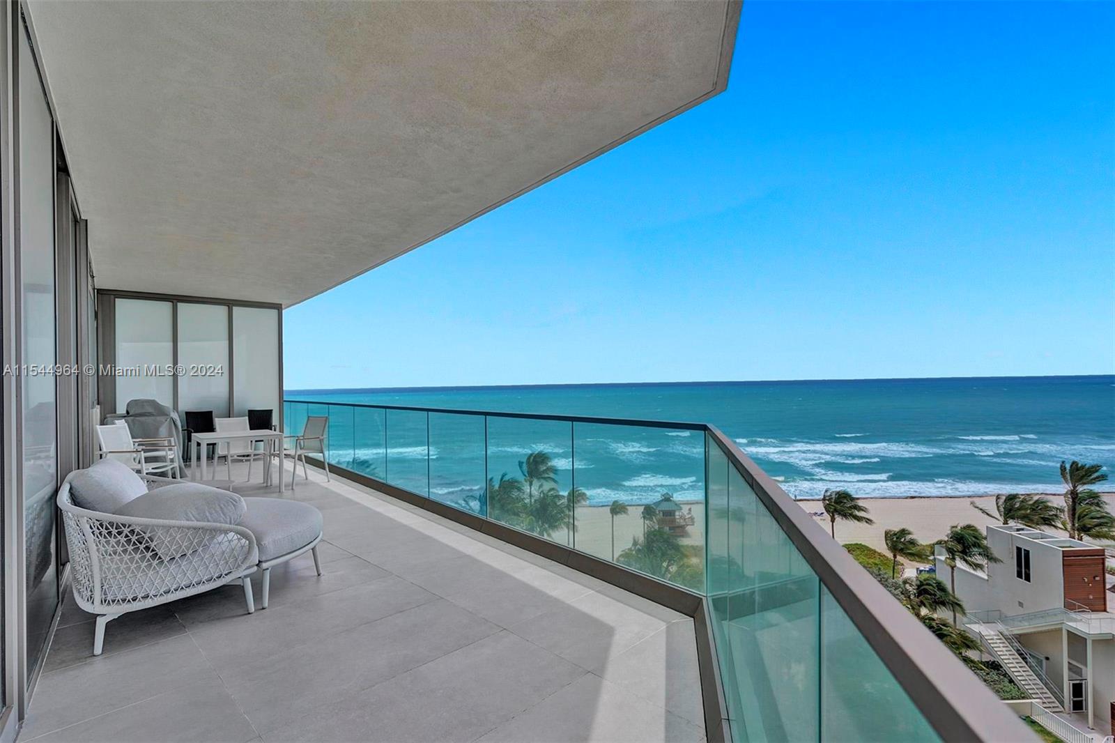 a balcony with view of ocean