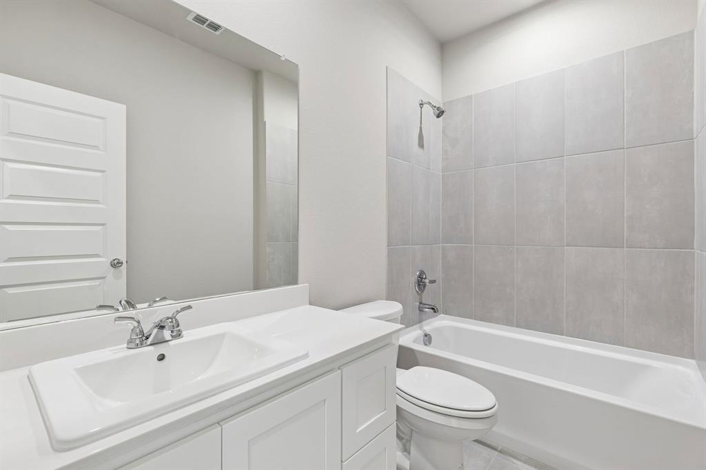 7716 Kingfisher Road Aubrey, TX 76227 - Photo 35 of 39 Bathroom in the Holden home plan by Trophy Signature Homes – REPRESENTATIVE PHOTO