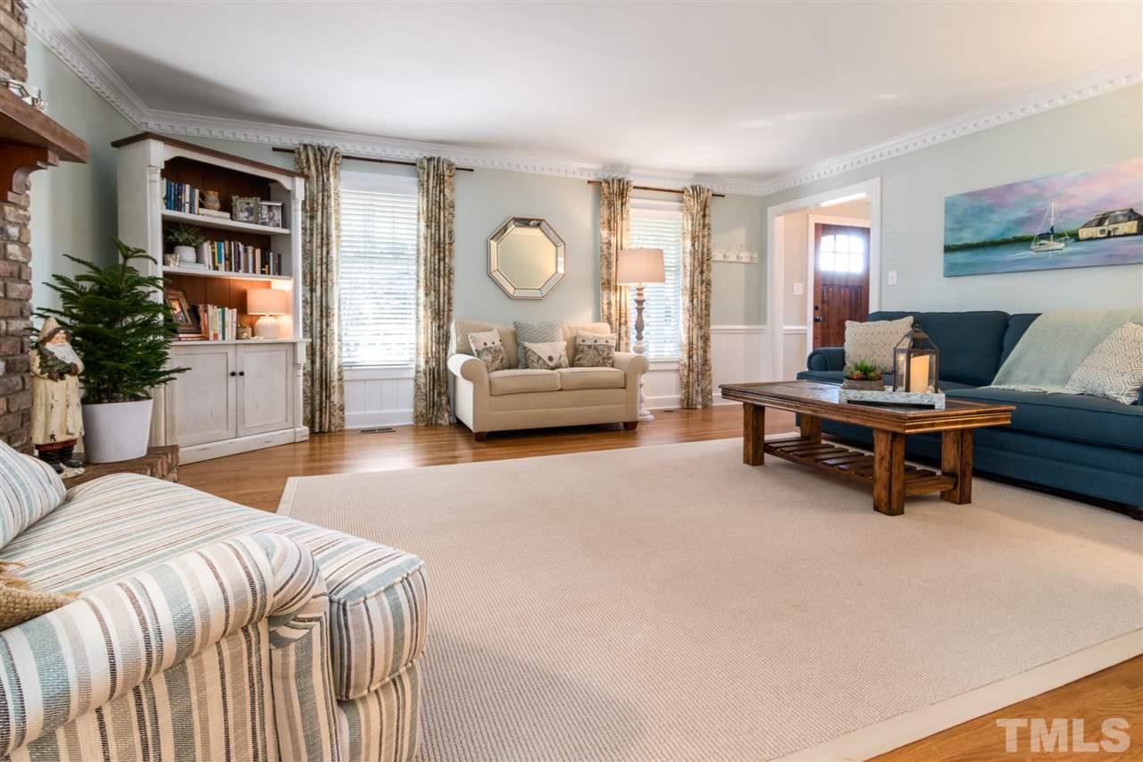 6304 Wynbrook Way Raleigh, NC 27612 - Photo 6 of 30 a bedroom with furniture and a large window