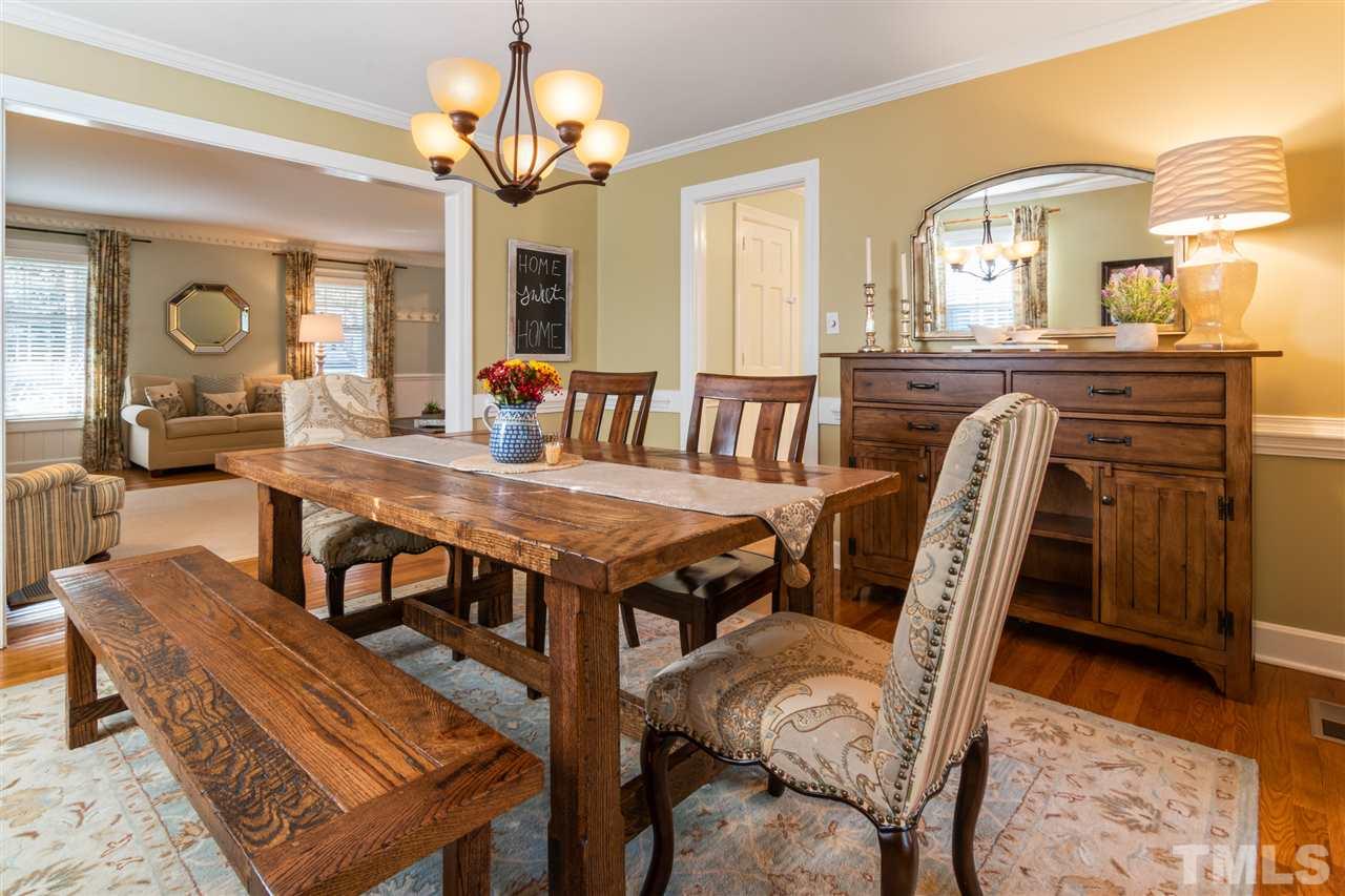 6304 Wynbrook Way Raleigh, NC 27612 - Photo 8 of 30 a view of a dining room with furniture