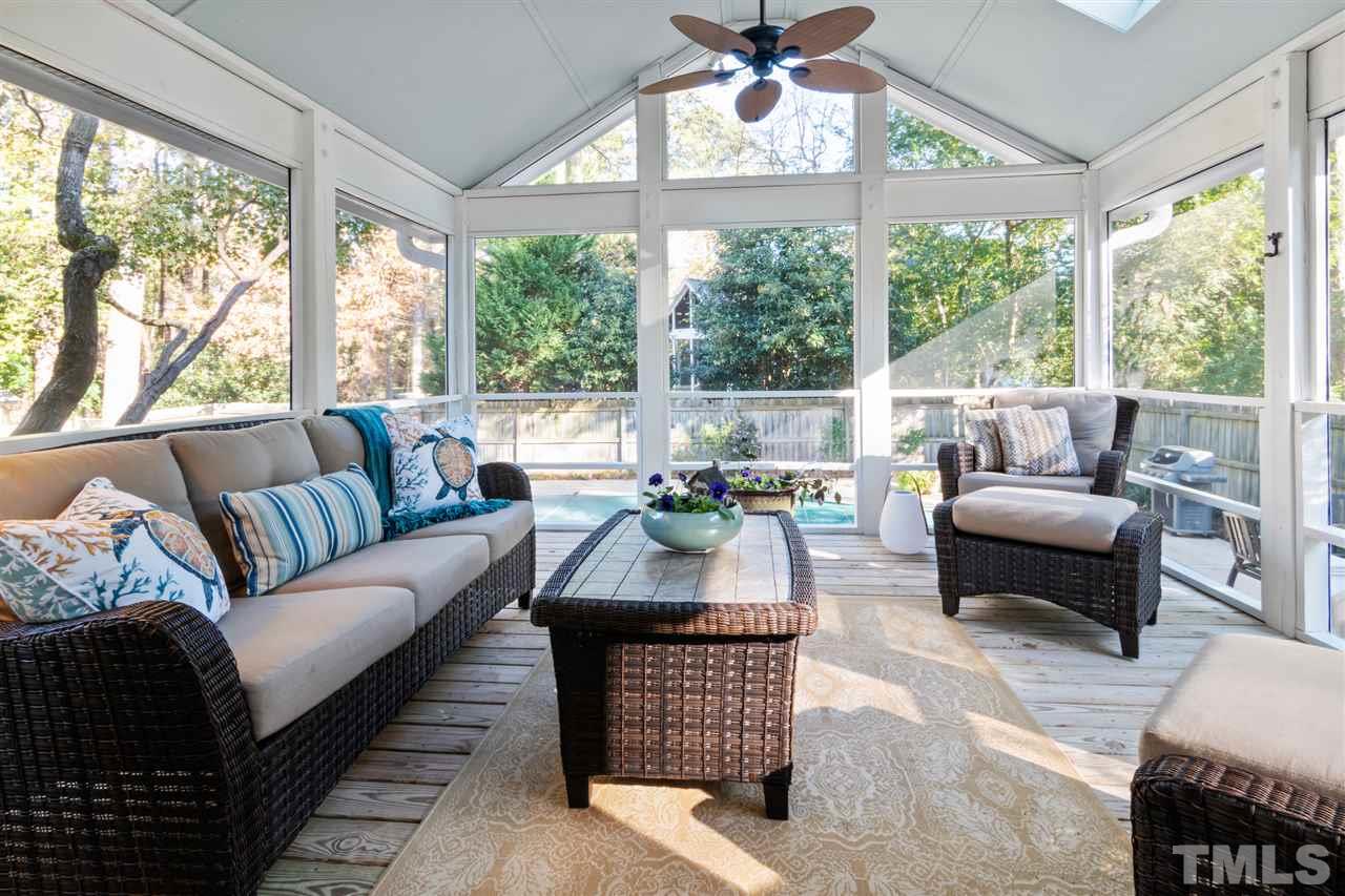 6304 Wynbrook Way Raleigh, NC 27612 - Photo 10 of 30 a living room with furniture and a large window