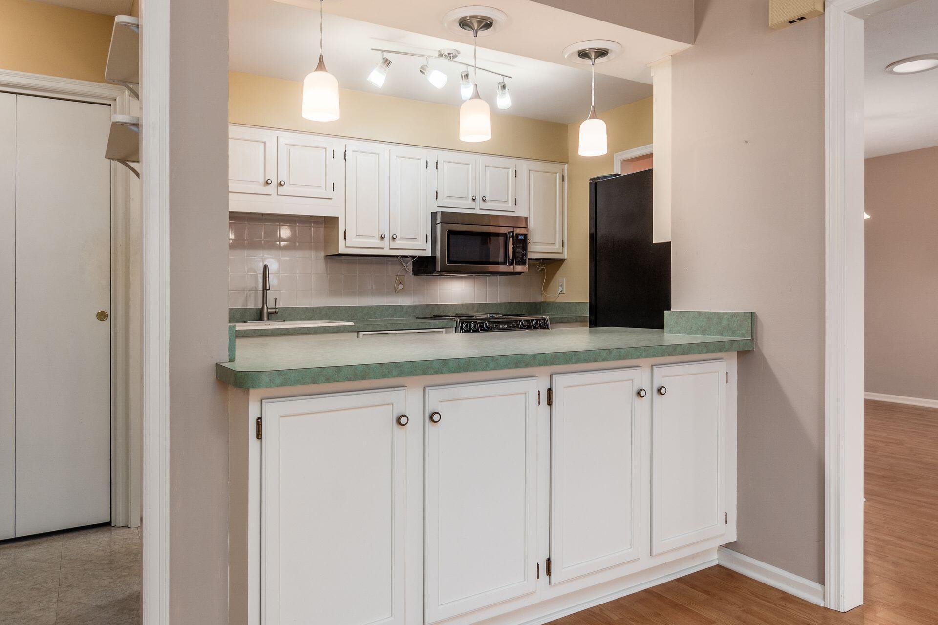 4765 Coach Road Columbus, OH 43220 - Photo 21 of 47 Room enough for 3 at the kitchen bar