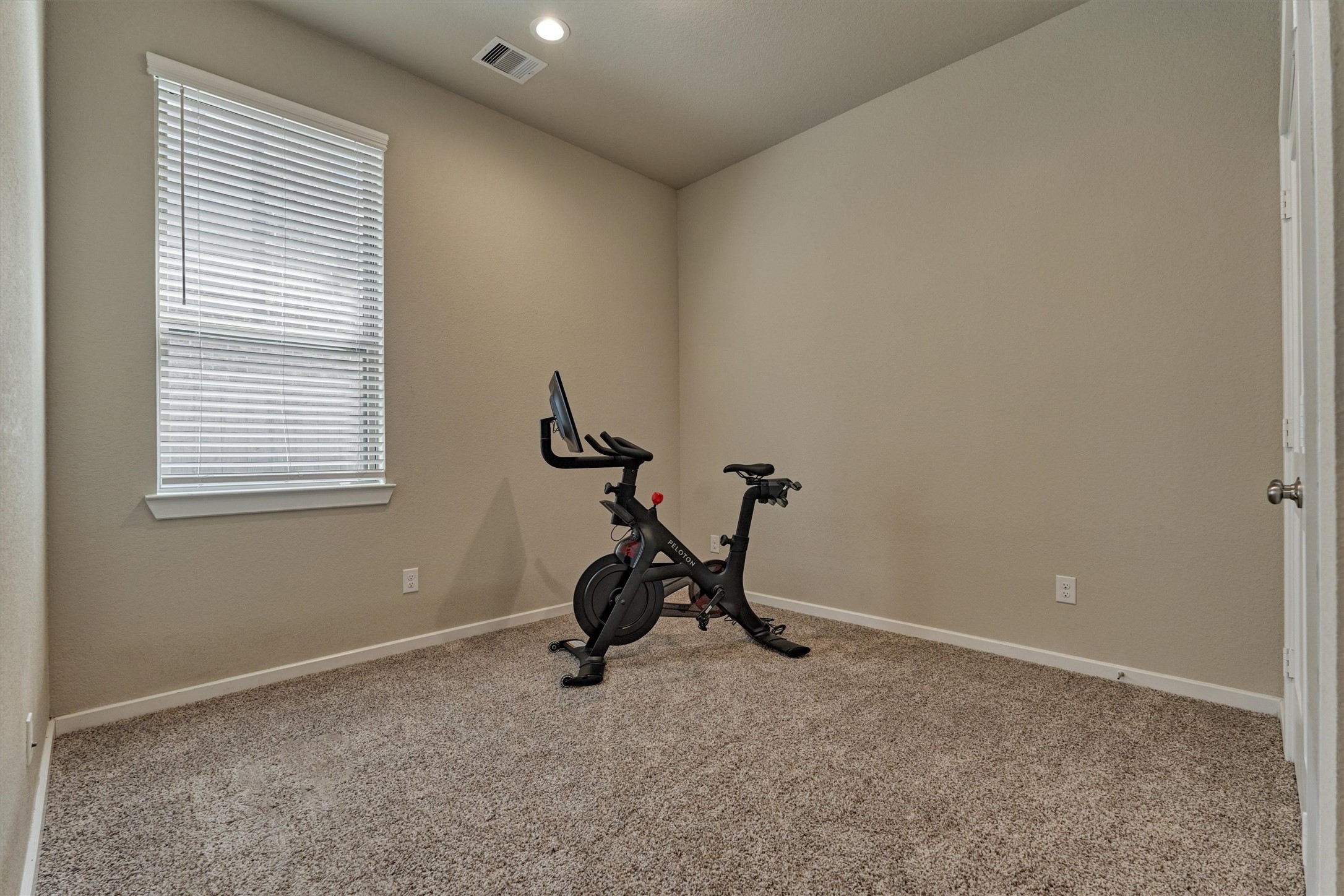 10545 Wild Chives Conroe, TX 77385 - Photo 26 of 34 a view of a room with a window