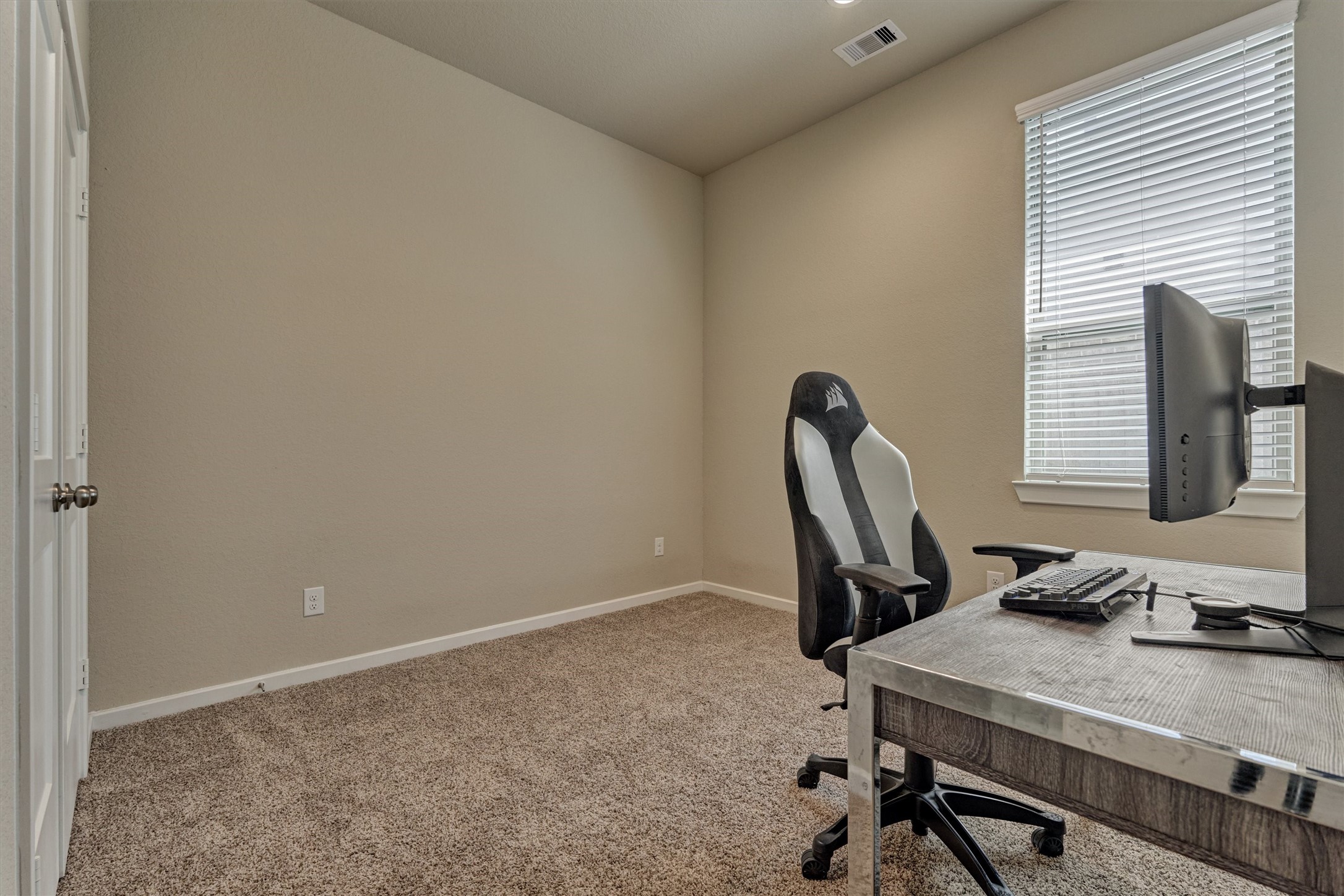 10545 Wild Chives Conroe, TX 77385 - Photo 29 of 34 a view of workspace with windows