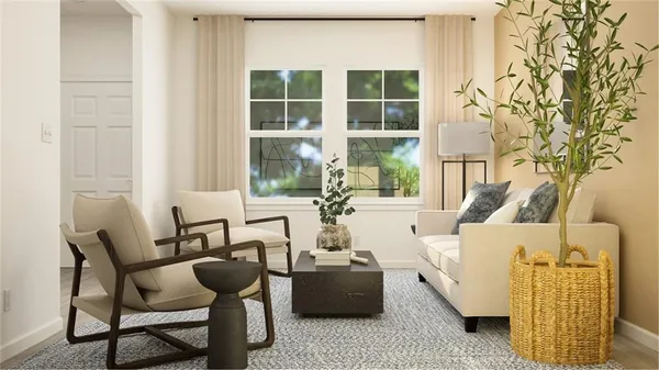 a living room with furniture and a window