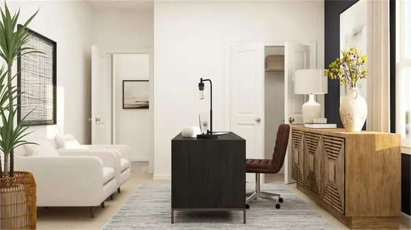 a bedroom with a bed and a table