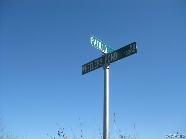 0 Wheeler Pond Road Dinwiddie, VA 23841 - Photo 8 of 10 a street sign on a wall