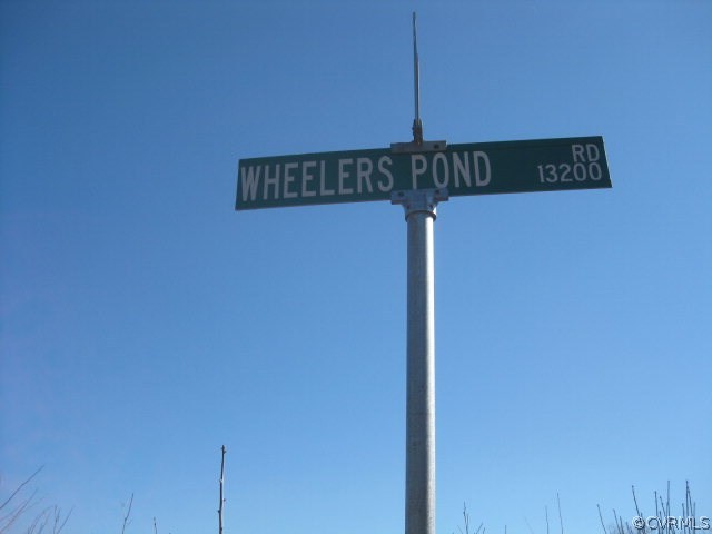 0 Wheeler Pond Road Dinwiddie, VA 23841 - Photo 10 of 10 a close up of a street sign