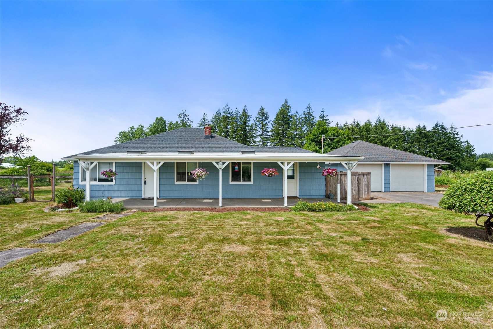 340 Meier Road Winlock, WA 98596 - Photo 1 of 26 a front view of a house with a garden