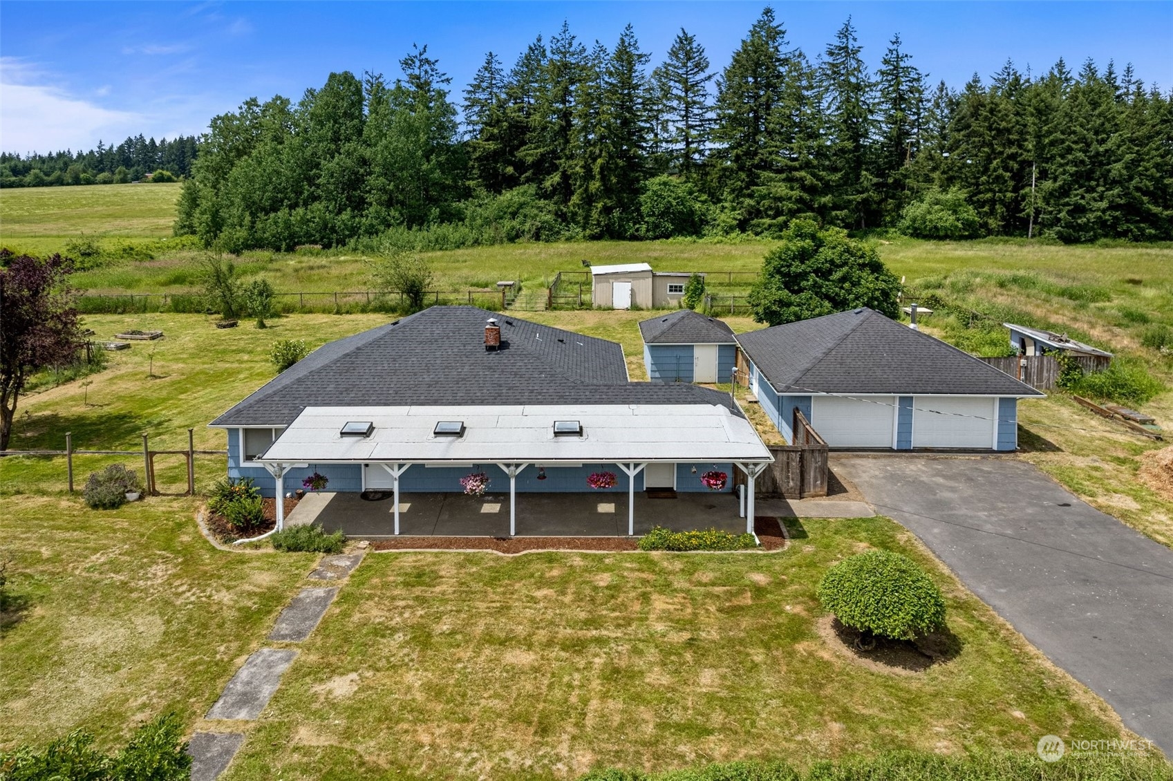 340 Meier Road Winlock, WA 98596 - Photo 3 of 26 an aerial view of a house with a garden and a table