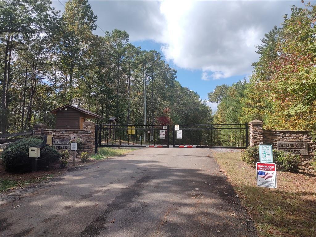 125 Adair Drive Ranger, GA 30734 - Photo 15 of 17 a street view with large trees