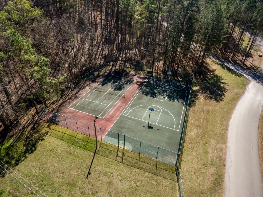 125 Adair Drive Ranger, GA 30734 - Photo 5 of 17 a view of a chairs and table in the backyard