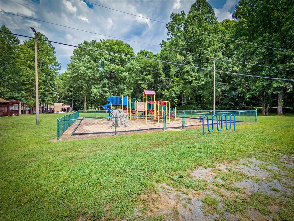125 Adair Drive Ranger, GA 30734 - Photo 9 of 17 a view of a park with swings