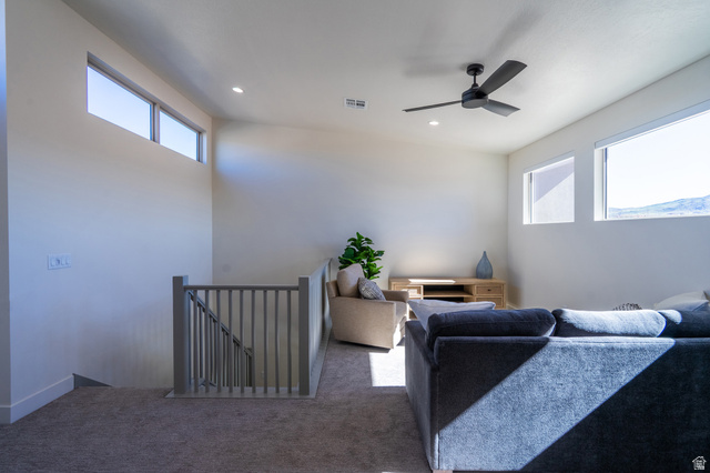 2972 West 570 North Hurricane, UT 84737 - Photo 66 of 104 Carpeted living area featuring ceiling fan and recessed lighting