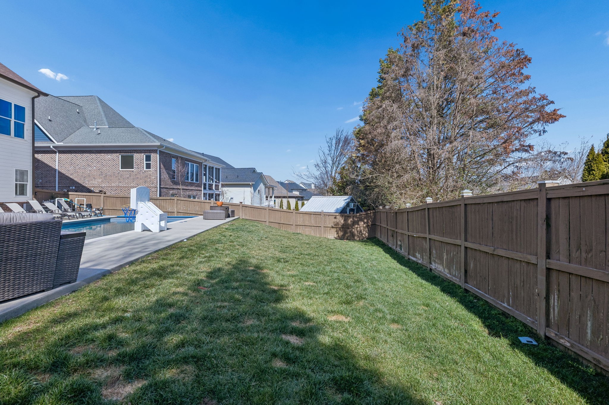 444 Wild Elm Street Franklin, TN 37064 - Photo 14 of 30 a view of a house with a yard and wooden fence