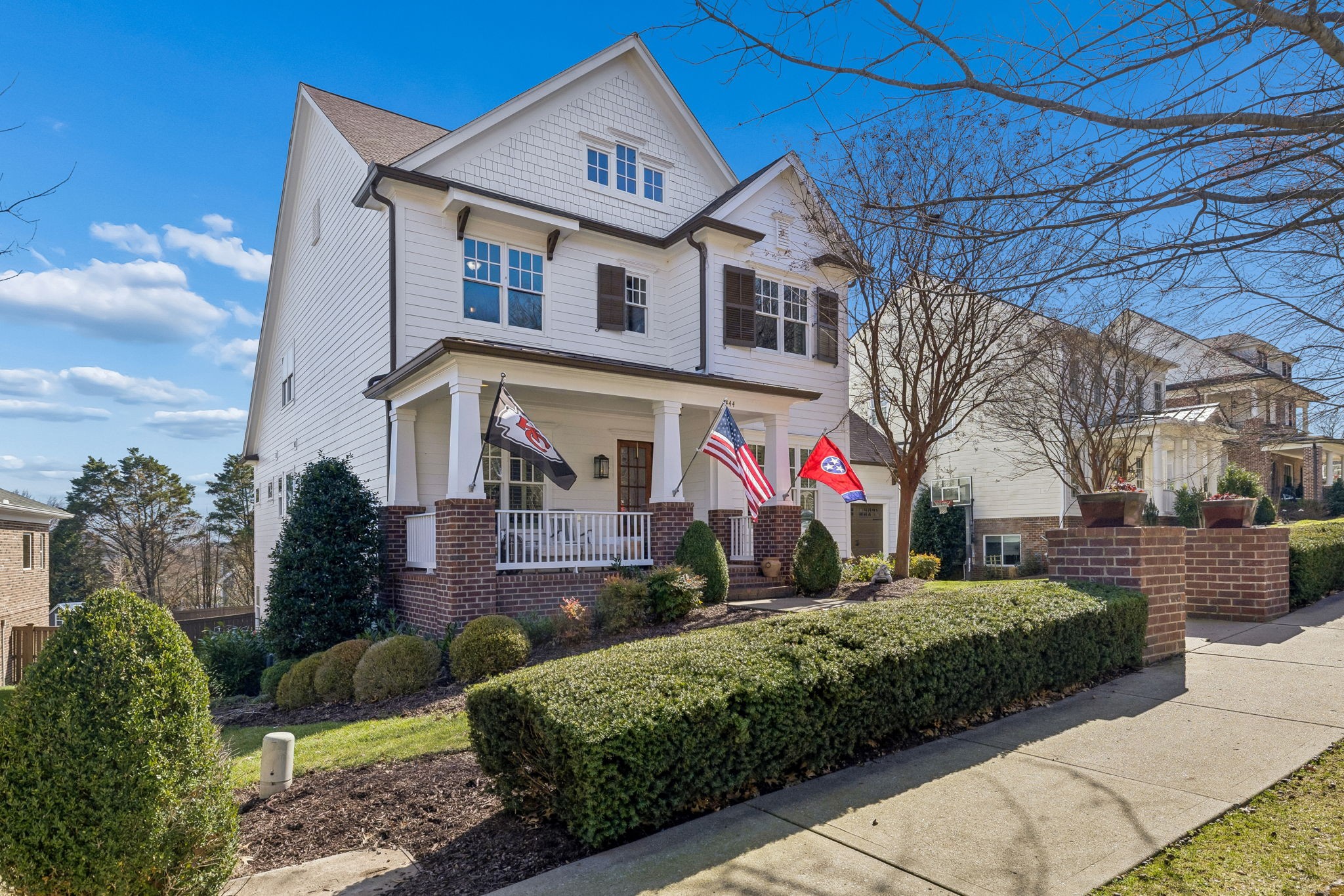 444 Wild Elm Street Franklin, TN 37064 - Photo 5 of 30 a front view of a house with a garden
