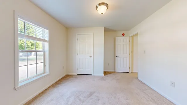 an empty room with windows