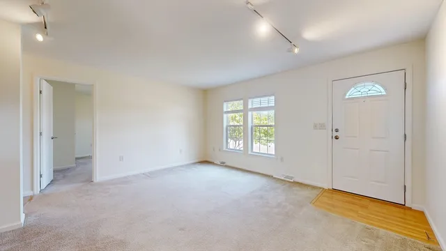 an empty room with windows