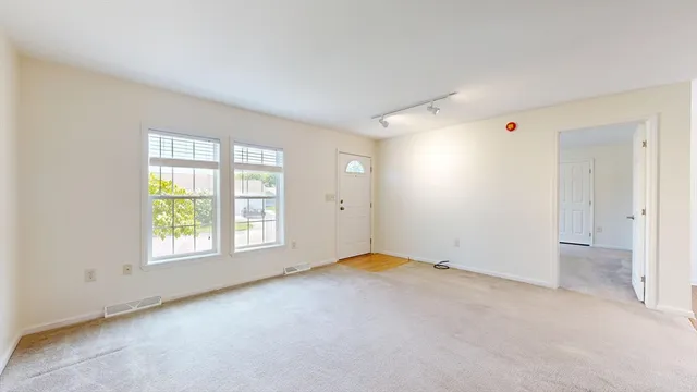 an empty room with windows