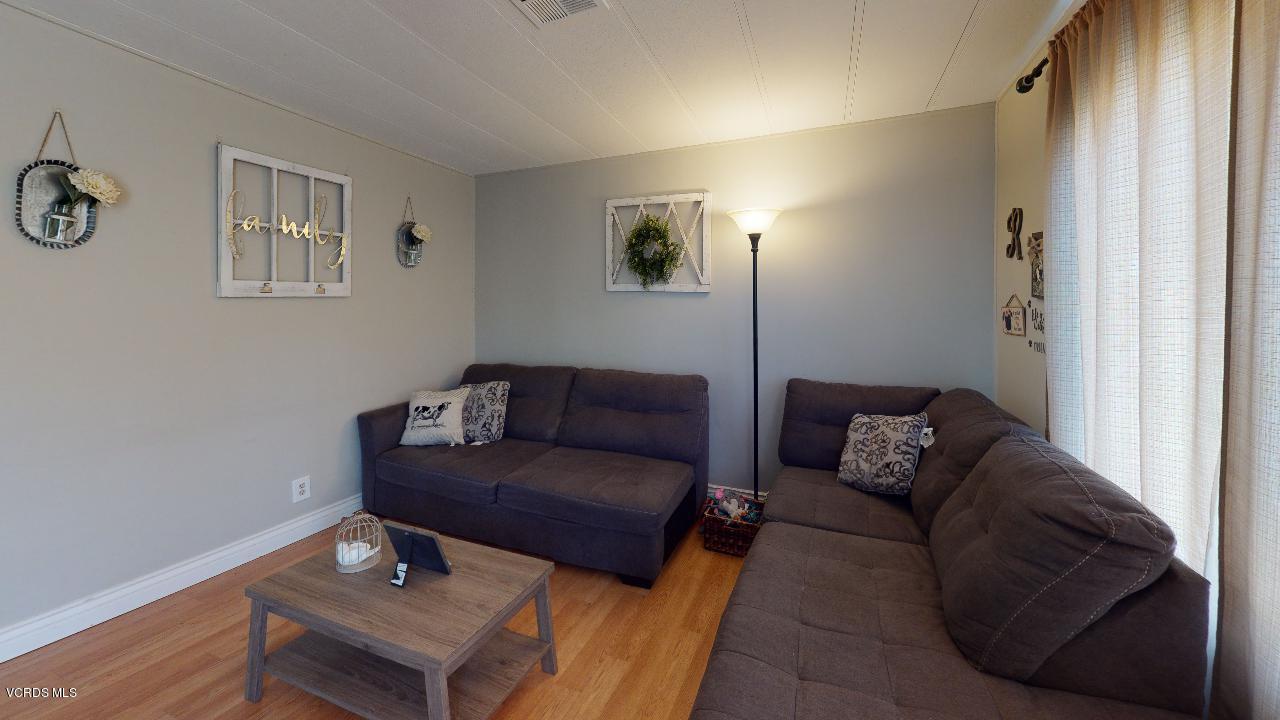 1550 Rory Lane, Unit 257 Simi Valley, CA 93063 - Photo 23 of 31 1550-Rory-Space-257-Living-Room(1)