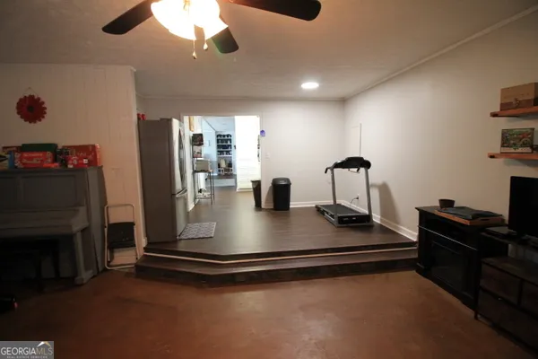 a view of a room with gym equipment
