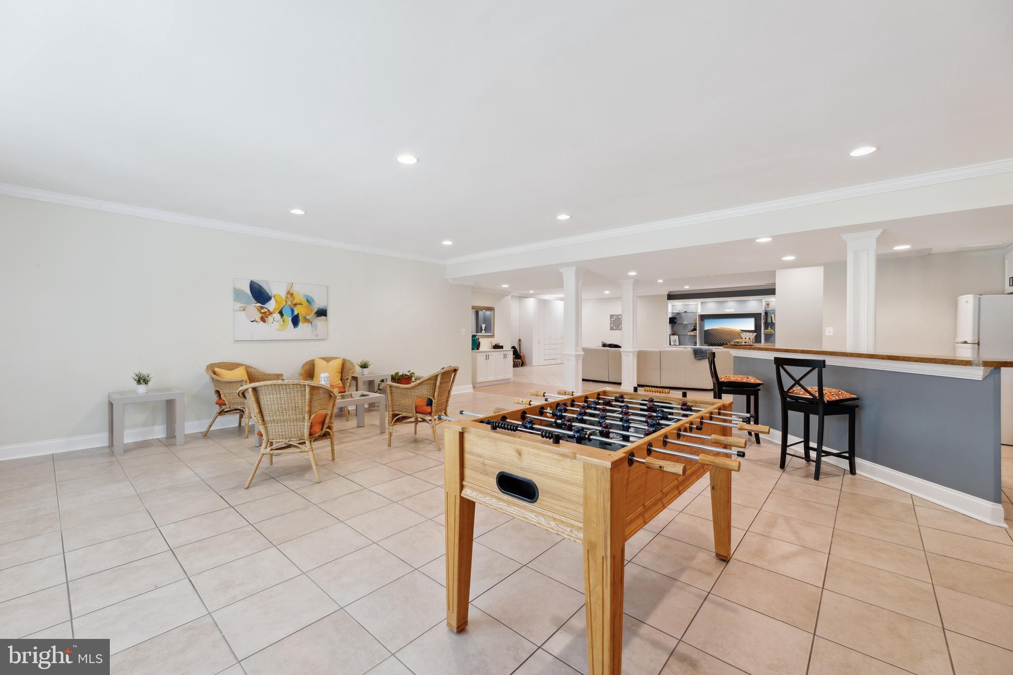 8810 Brickyard Road Potomac, MD 20854 - Photo 103 of 136 Lower level rec area w/ full wet bar & walkout