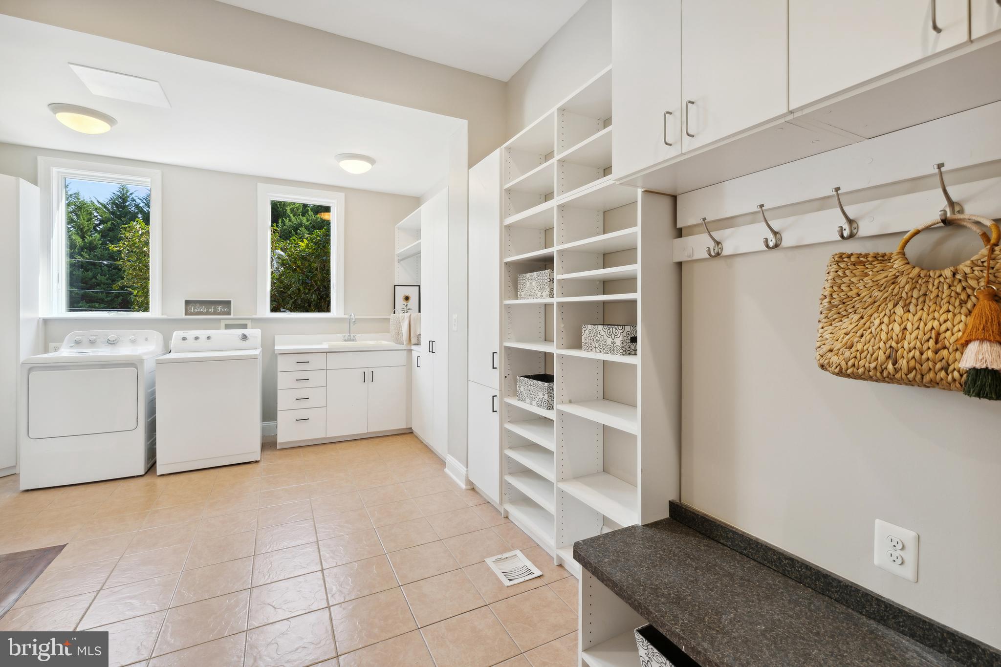 8810 Brickyard Road Potomac, MD 20854 - Photo 42 of 136 Laundry Room with storage