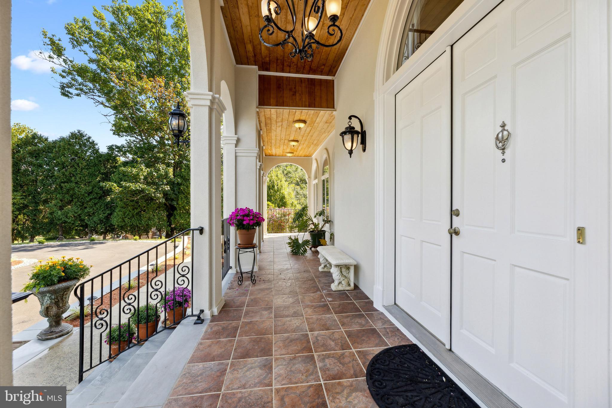 8810 Brickyard Road Potomac, MD 20854 - Photo 8 of 136 Gorgeous front porch with planked ceiling & lights