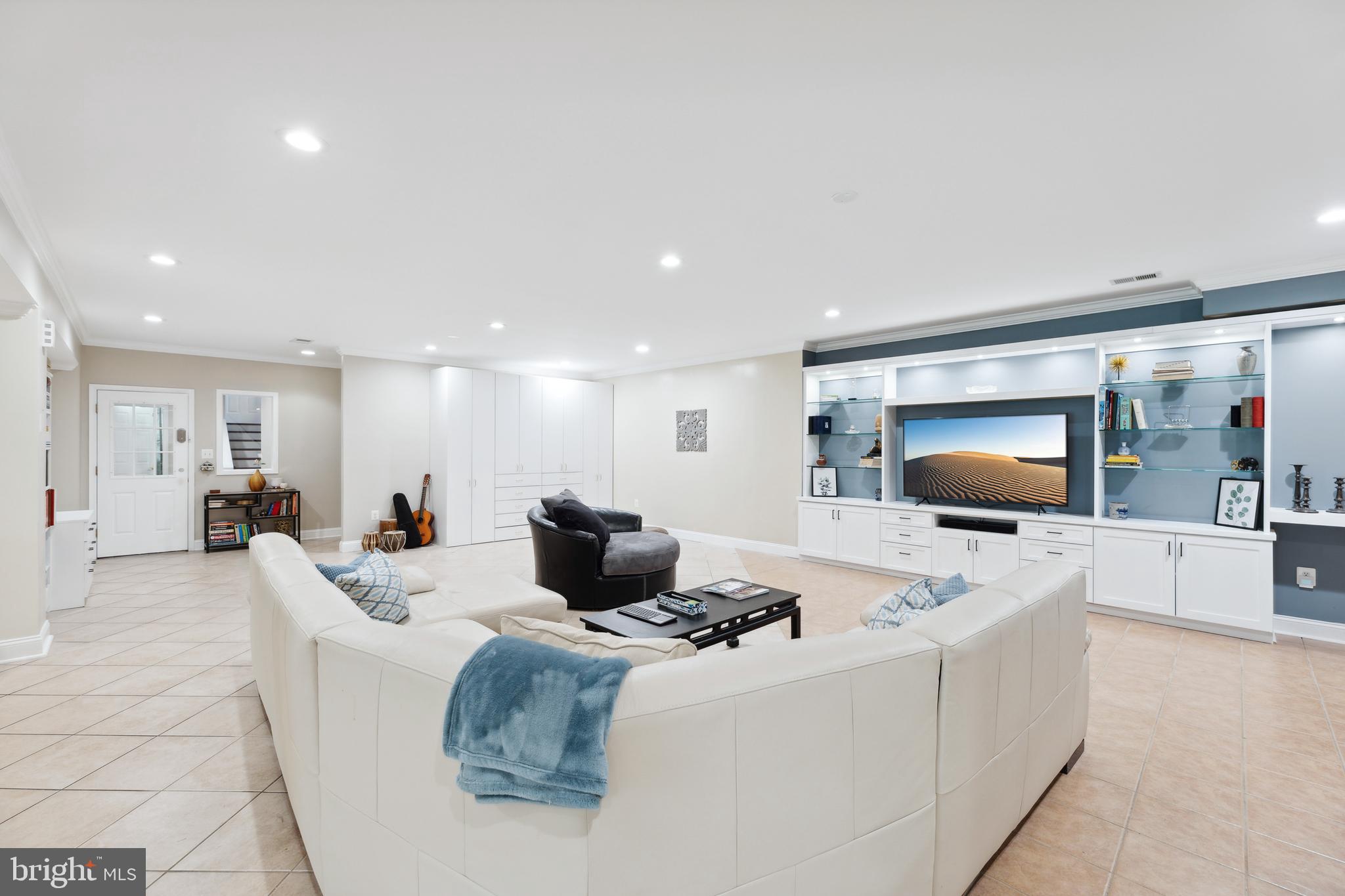 8810 Brickyard Road Potomac, MD 20854 - Photo 98 of 136 Lower level rec area w/ full wet bar & walkout