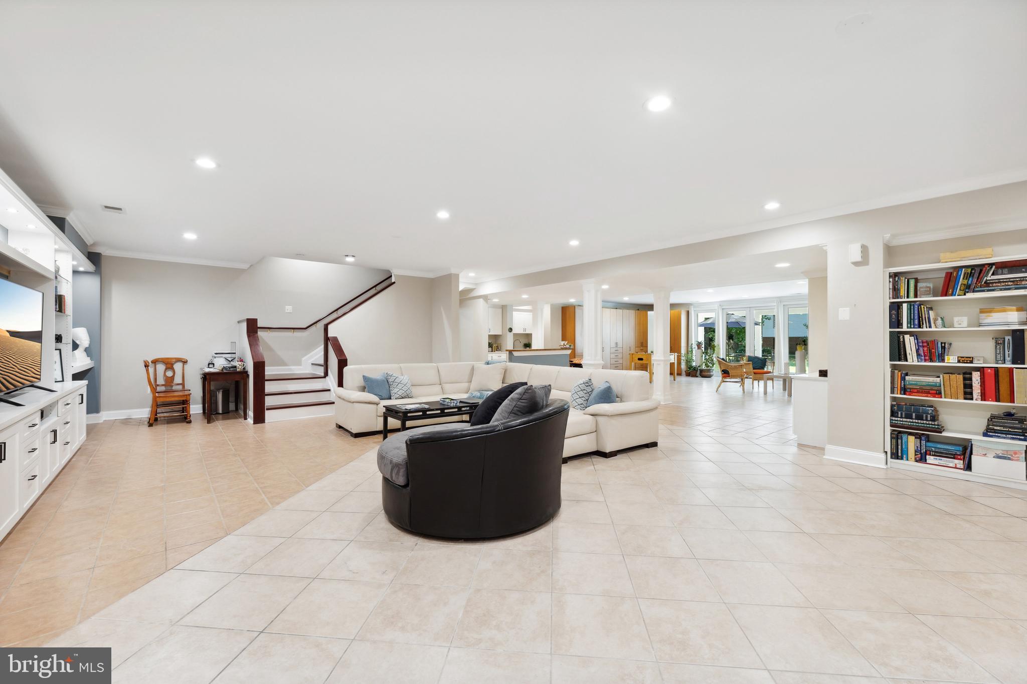 8810 Brickyard Road Potomac, MD 20854 - Photo 100 of 136 Lower level rec area w/ full wet bar & walkout