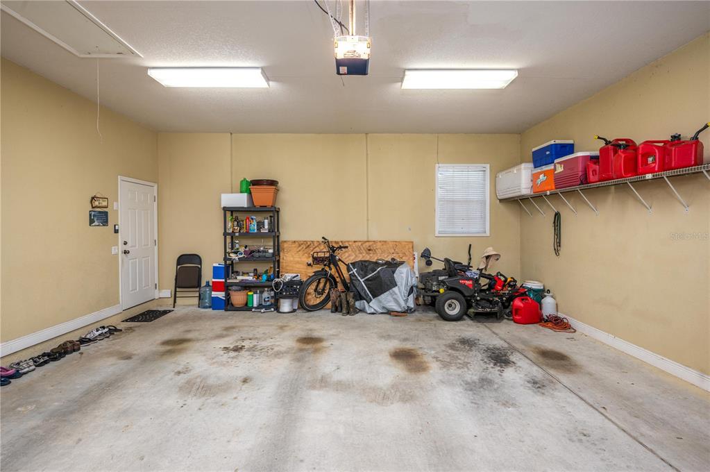 35 Stembridge Road Lake Wales, FL 33898 - Photo 44 of 61 a view of a garage with rack and bicycle
