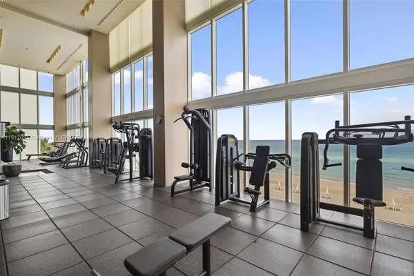 a picture of a room with a floor to ceiling window