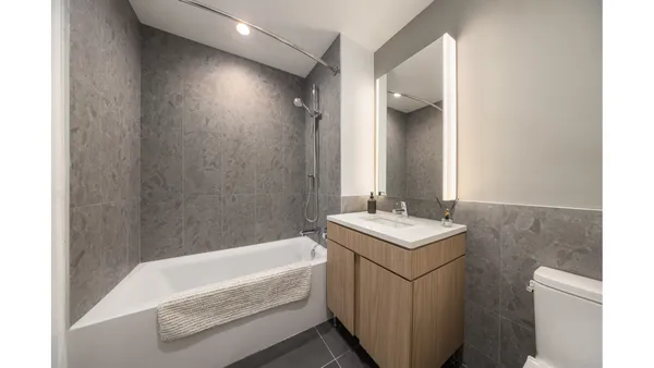 a bathroom with a sink and a bathtub