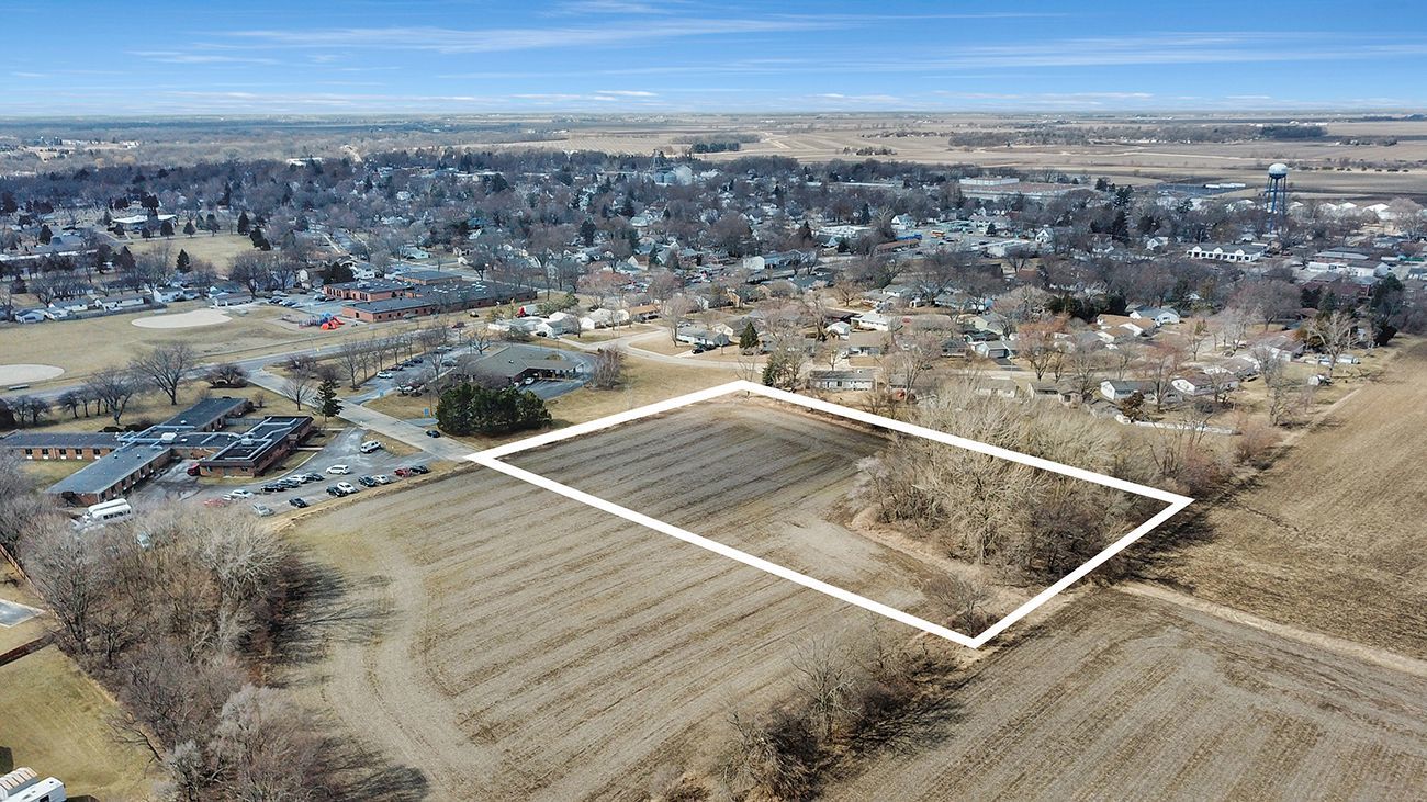 1 Resource Lane Genoa, IL 60135 - Photo 3 of 8 an aerial view of residential houses with outdoor space