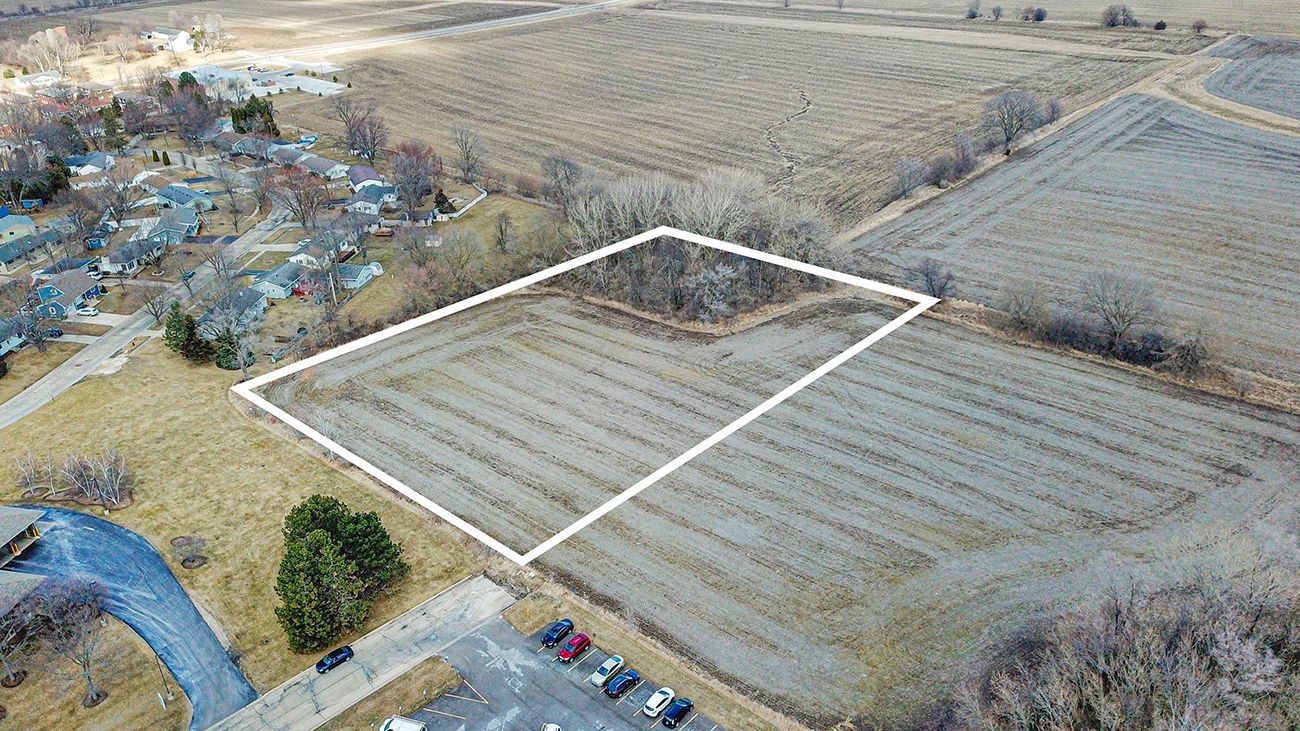 1 Resource Lane Genoa, IL 60135 - Photo 5 of 8 a view of wooden floor with sky view