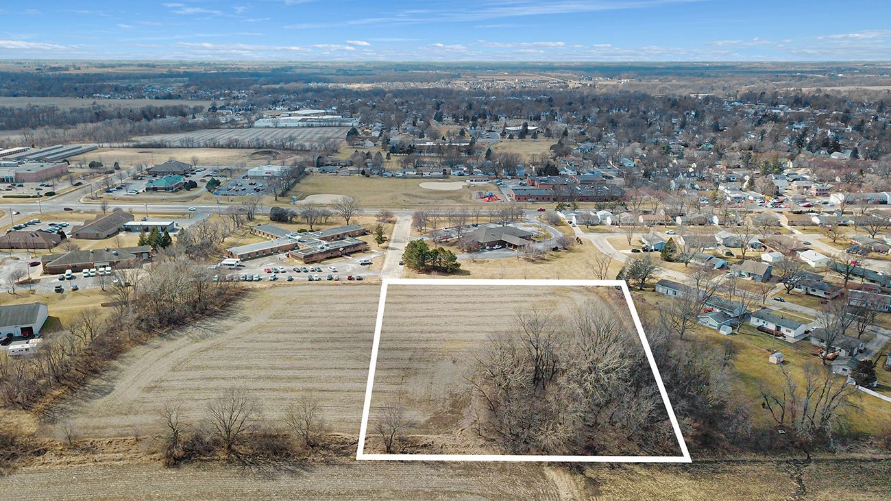 1 Resource Lane Genoa, IL 60135 - Photo 7 of 8 an aerial view of residential houses with outdoor space