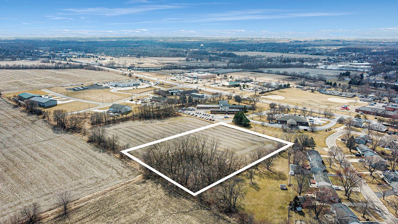 1 Resource Lane Genoa, IL 60135 - Photo 8 of 8 an aerial view of residential houses with outdoor space