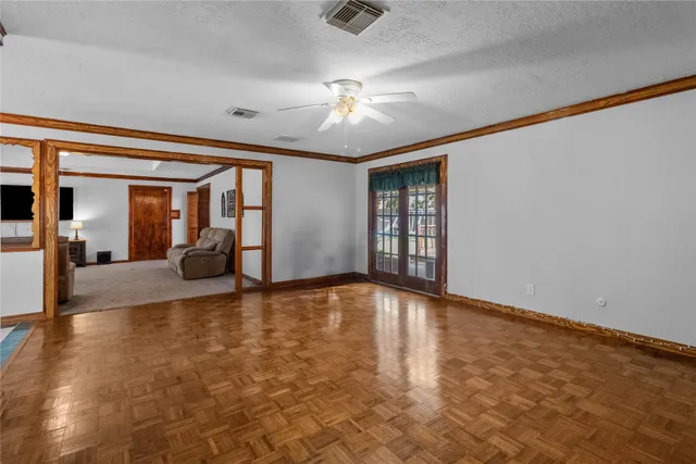 a view of an empty room and window