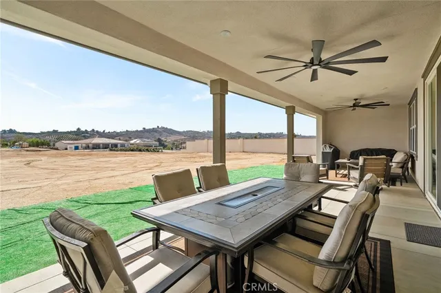 a front view of house with a garden