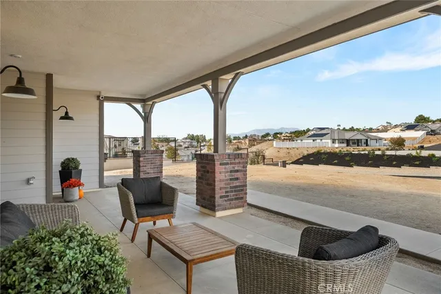 a roof deck with patio